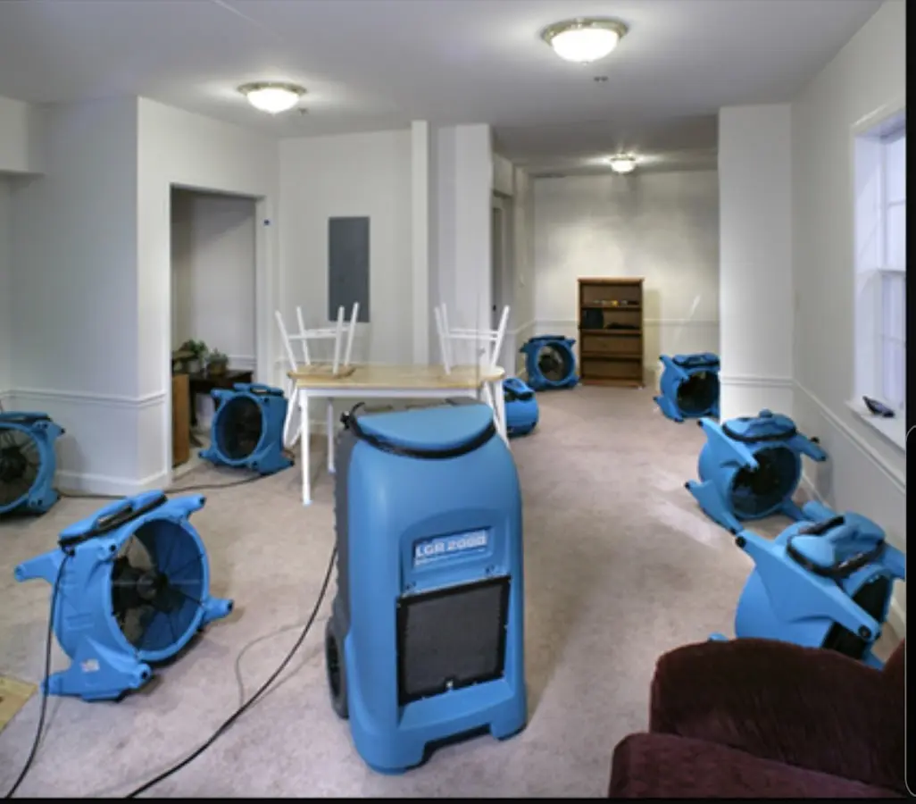 Air movers and dehumidifier setup for Water Extraction & Removal in Newport